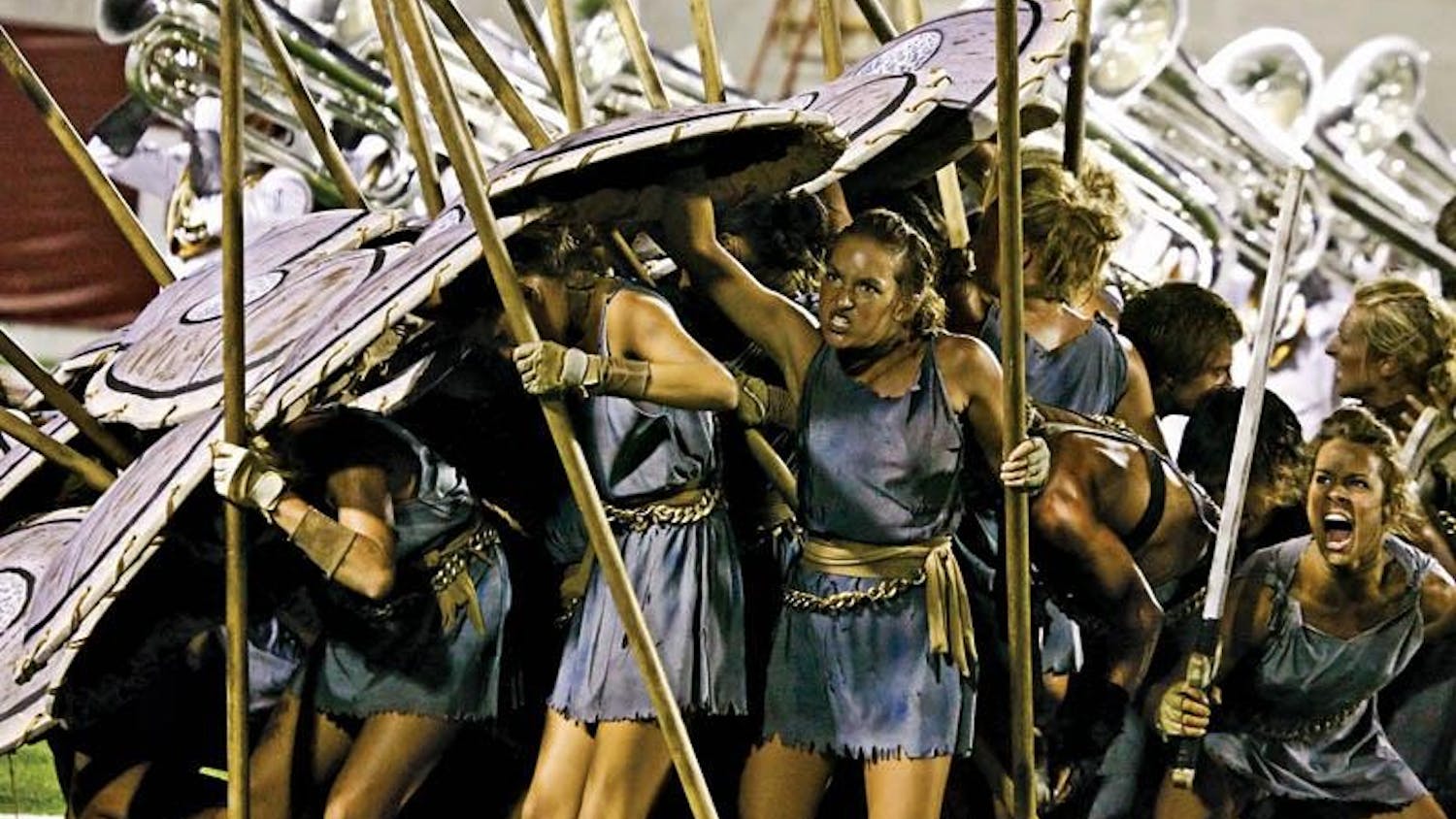 Members of the Phantom Regiment Colorguard prepare to attack the "Emperor" in their performance of "Spartacus."  
