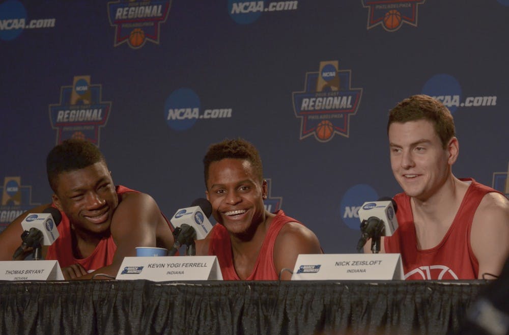Freshman center Thomas Bryant, senior guard Yogi Ferrell, and Senior guard Nick Zeisloft laugh answering questions during the post practice press conference on Thursday at the Wells Fargo Center. Tomorrow, the Hoosiers will play the Tarheels in the Sweet Sixteen round of the NCAA Tournament.
