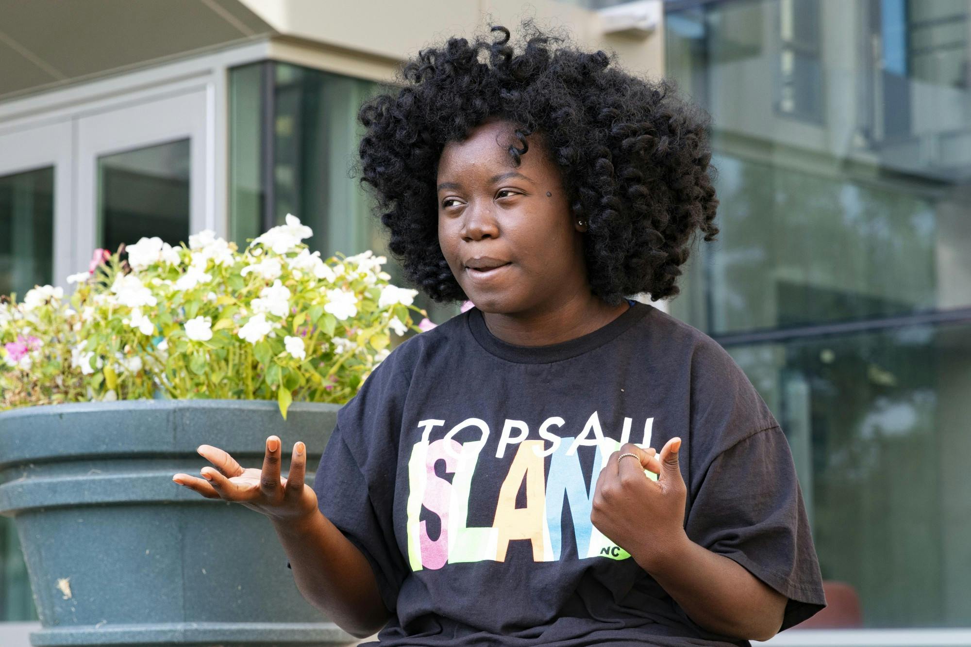 Junior Massa Massaley explains what it feels like to go to Indiana University as a Black student Oct. 6, in front of the Global International Studies Building in Bloomington. “Being Black is like being very hyper visible but at the same time being invisible,” she said.