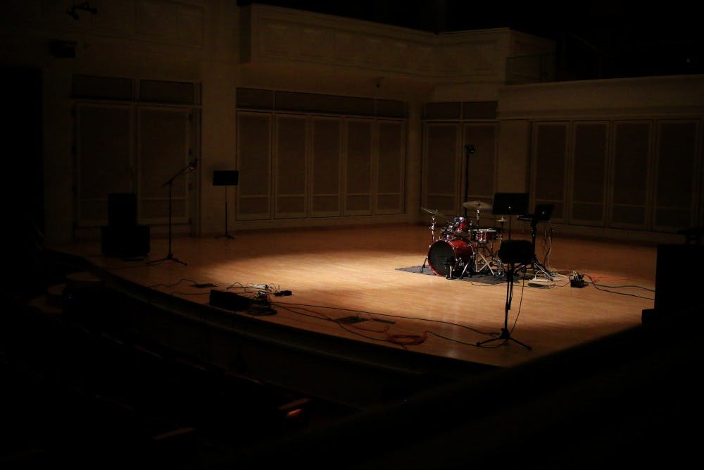 The Auer Concert Hall stage stays empty during “Do Not Break Anything,” written by Daniel Allen. The piece was part of the Computer Music Recital that took place Dec. 2. 