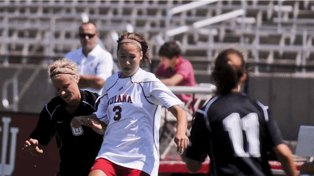 Freshman midfielder Tori Keller attempts to prevent Oakland's Marlen Knoph from stealing the ball during Hoosiers' match against the Grizzlies Aug 28 at Bill Armstrong Stadium. 