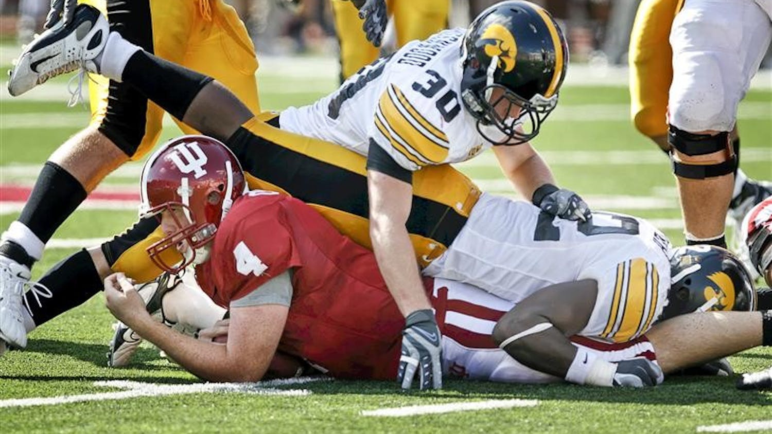 Sophomore quarterback Ben Chappell is tackled at the line of scrimmage during the Hoosiers 45-9 loss to Iowa on Saturday afternoon at Memorial Stadium. The 2-4 Hoosiers suffered its fourth loss in a row.