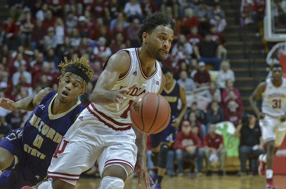 Sophomore guard James Blackmon Jr. trips up his Alcorn State defender as he drives for layup Monday at Assembly Hall. The Hoosiers won 112-70.