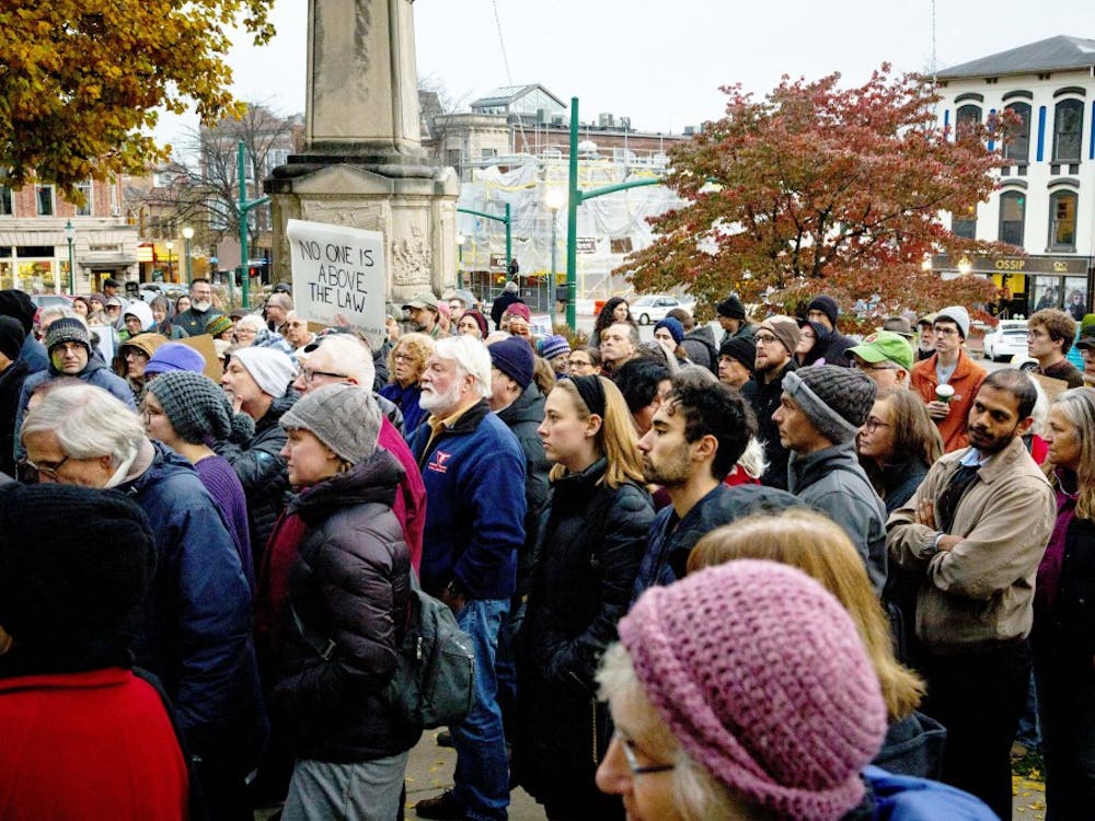 Protesters listen to Attorney Shelly McBride speak Nov. 8 outside the Monroe County Courthouse during a protest against the firing of Attorney General Jeff Sessions. President Trump had been critical of Sessions after he recused himself from the Russia investigation in 2017.&nbsp;