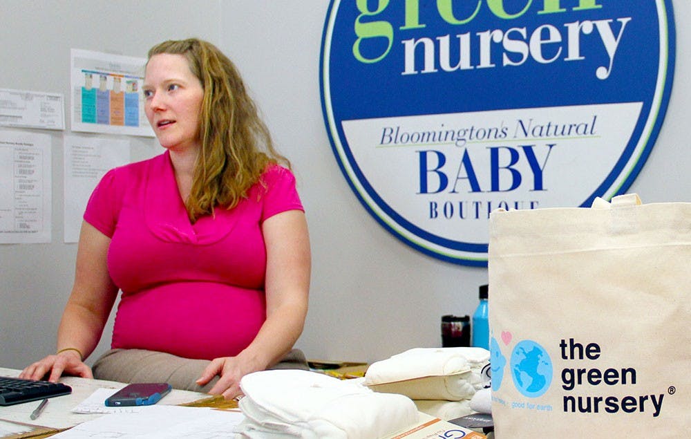 Sales Associate, Alyssa Jones, works her shift  Wednesday at The Green Nursery, Jones said raising a child now is not much different than it used to be because the ultimate goal is to keep the child alive.