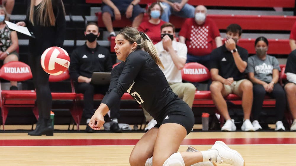 Junior defensive specialist Paula Cerame digs the ball Sept. 17, 2021, in Wilkinson Hall. Indiana volleyball lost both of its matches this weekend. 