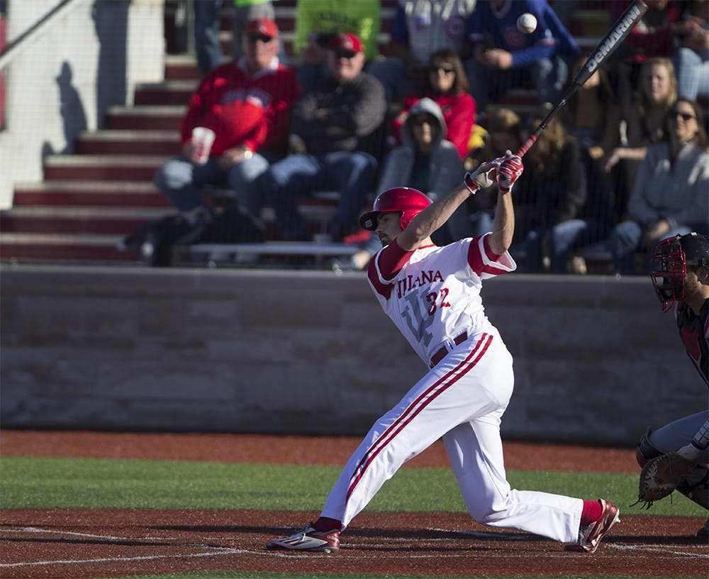 Freshman outfielder Luke Miller swings his bat during the game against Ball State on Wednesday night at Bart Kaufman field. The Hoosiers won 4-3.