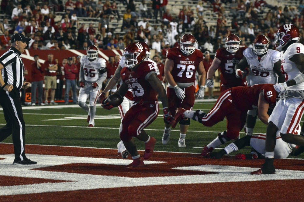 Senior Running Back Alex Rodriguez scores the game-winning touchdown in the IU spring game on Thursday. The Crimson team beat the Cream team 42-36.