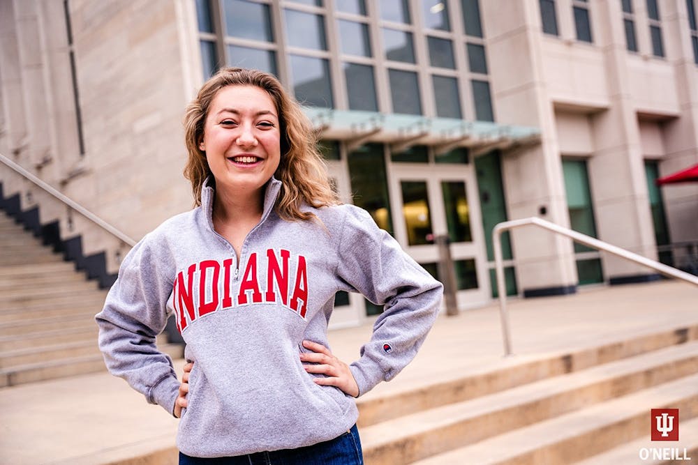 Undergraduate student Megan Bankowski poses in front of the O'Neill School of Pubic and Environmental Affairs. O'Neill offers several introductory courses for students seeking a general education credit.