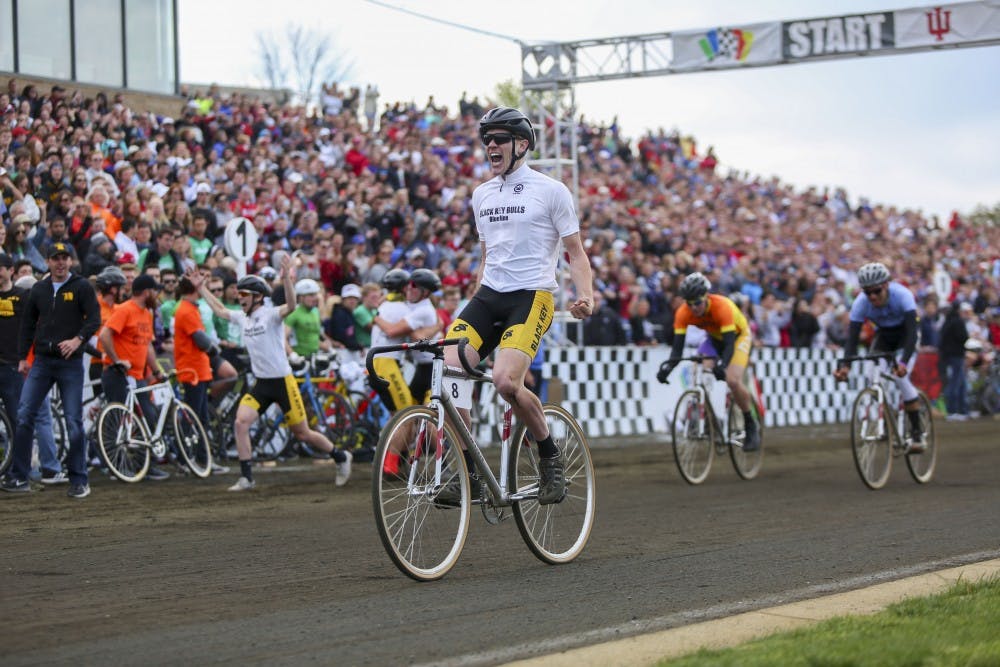 Junior Kevin Mangel crosses the finish line of the Men's 2017 Little 500 Bike Race.  The Black Key Bulls clinched their second Little 500 title at the Bill Armstrong Stadium Saturday.  