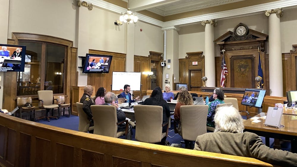 The Community Justice Reform Committee is seen March 6, 2023, in the Monroe County Courthouse to discuss building a new county jail. The meeting was preceded by a Care Not Cages Block Party outside the courthouse.