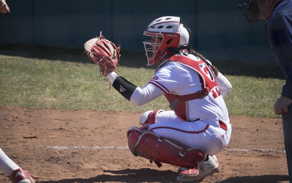 Freshman catcher, Bella Norton waits for a pitch. The Hoosiers took on the Scarlet Knights last weekend winning two games on Friday but lost on Saturday.