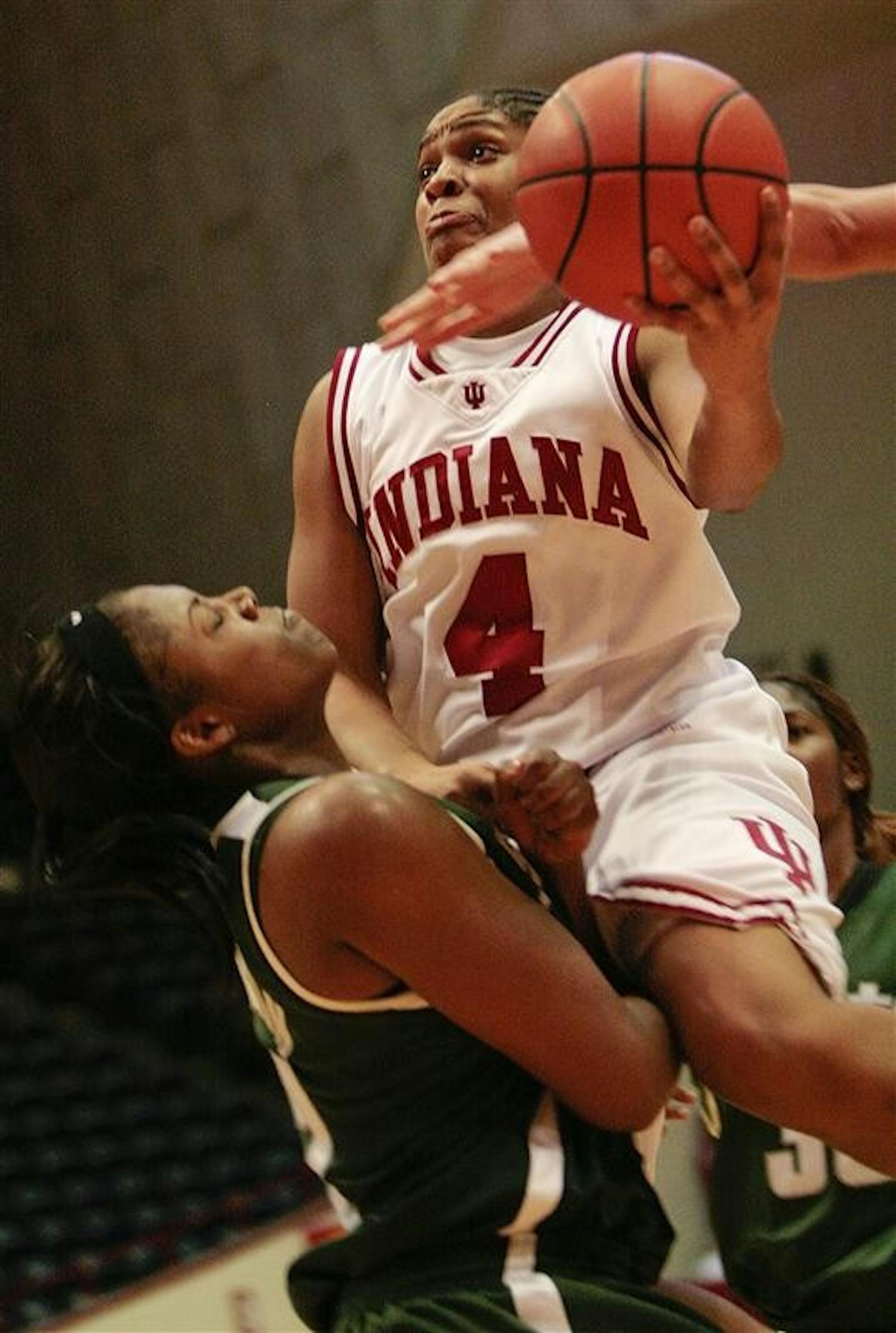 Freshman guard Ashlee Mells charges into the lane during the Hoosiers 71-65 loss to Michigan State Thursday evening at Assembly Hall. The Hoosiers face Wisconsin on the road today in Madison, Wisc..
