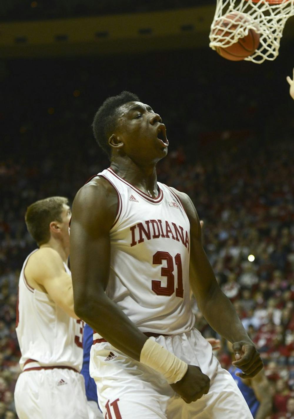 Freshman center Thomas Bryant celebrates after drawing the foul for a three-point play during the game against Creighton on Thursday at Assembly Hall.