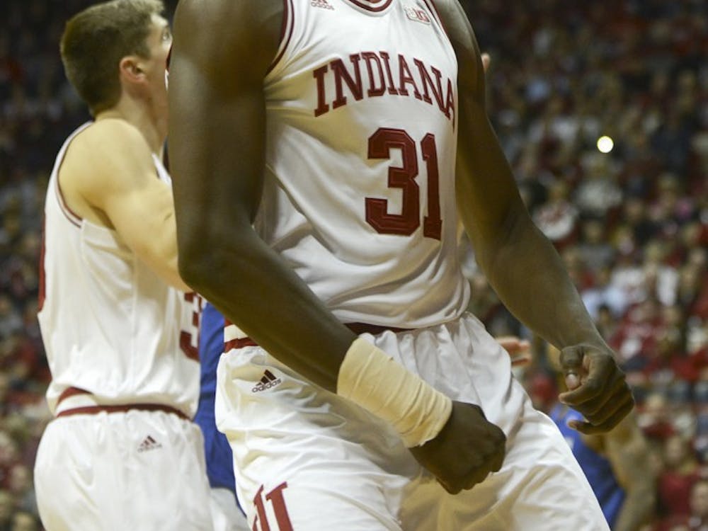 Freshman center Thomas Bryant celebrates after drawing the foul for a three-point play during the game against Creighton on Thursday at Assembly Hall.