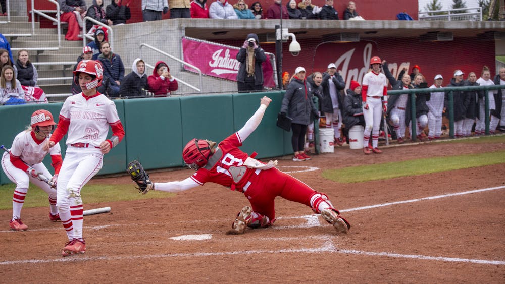 Freshman Avery Parker attempts to tag out a runner April 1, 2023, at Andy Mohr Field. This weekend, the Hoosiers swept Rutgers in New Jersey.