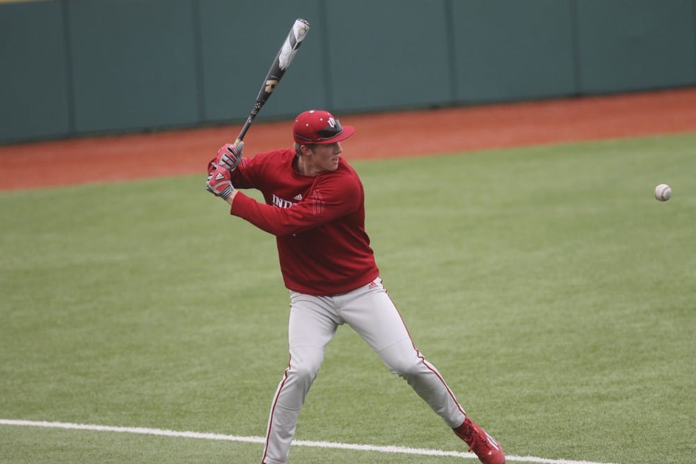 Freshman outfielder Logan Sowers practices his swing on Feb. 11, 2015, at Bart Kaufman Field. 