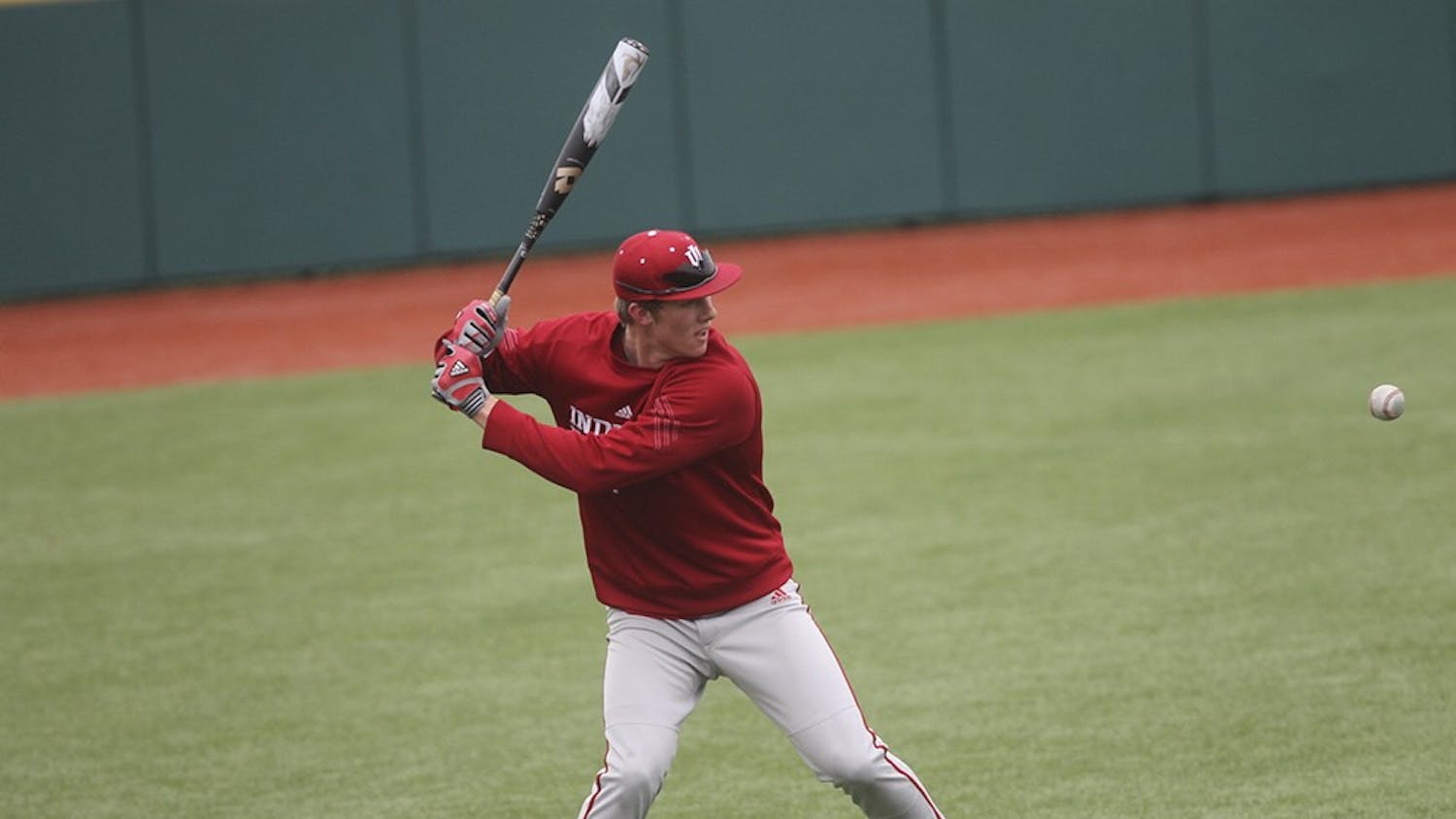 Freshman outfielder Logan Sowers practices his swing on Feb. 11, 2015, at Bart Kaufman Field. 
