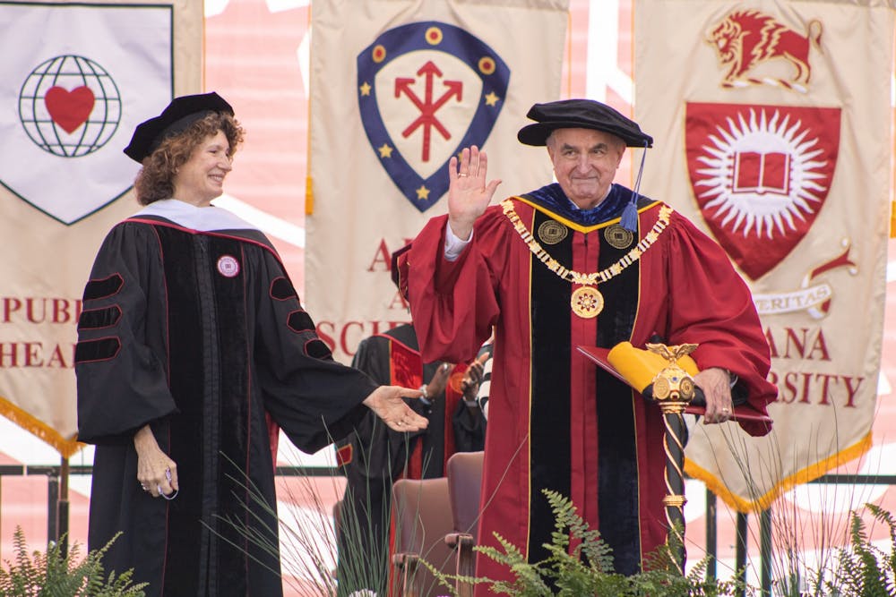 <p>Then-IU President Michael McRobbie at IU-Bloomington&#x27;s undergraduate commencement ceremony May 8, 2021. IU’s spring 2022 undergraduate commencement ceremony will be held in-person May 7 and the graduate ceremony will be held May 6.</p>