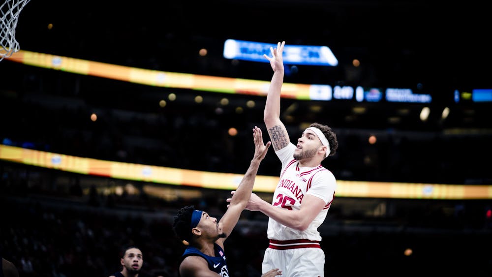 Graduate senior forward Race Thompson shoots a jumper Mar. 11, 2023, at the United Center in Chicago, Illinois. Penn State defeated Indiana 77-73.