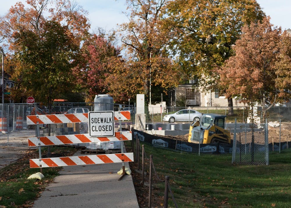 Construction blocks the sidewalk Tuesday at Seventh Street and Indiana Avenue. IU has been constructing a $340,000 gateway on the corner.