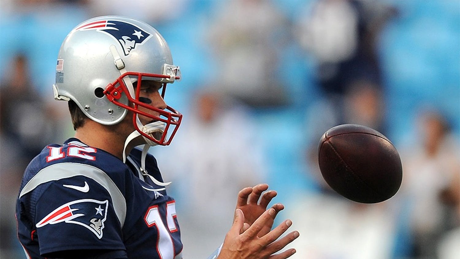 New England Patriots quarterback Tom Brady during a warmups prior to preseason action against the Carolina Panthers on Aug. 28 at Bank of America Stadium in Charlotte, N.C. Four games into the NFL season, Brady leads in passing yards and tied for second in touchdowns.