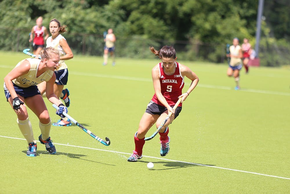 Senior Caitlin Bearish protects the ball in the IU's game against UC Davis on Sept. 6 at the Field Hockey Complex.
