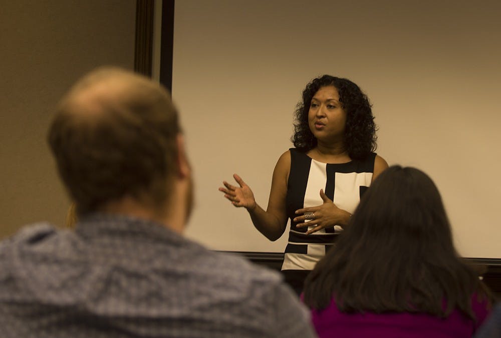Dr. Amrita Chakrabarti Myers of the Department of History gives a lecture about her new project discussing the interracial relationship between Vice President Richard Johnson and Julia Chinn on Tuesday in the IMU.