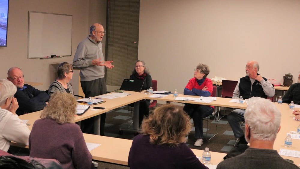 George Hegeman and other concerned citizens band together Jan. 17 at Monroe County Public Library to put forward a plan to conduct redistricting in order to prevent gerrymandering. The completed plan will be sent to Indiana Legislature. 