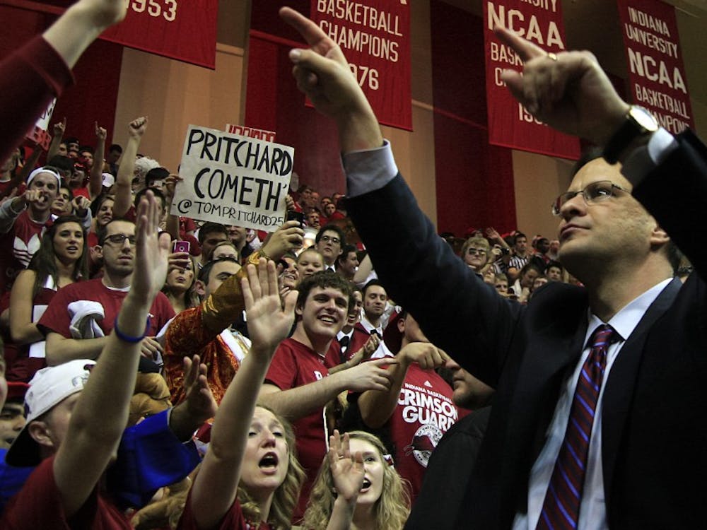 Coach Tom Crean greets students after a 70-55 win against Michigan State on Tuesday at Assembly Hall.