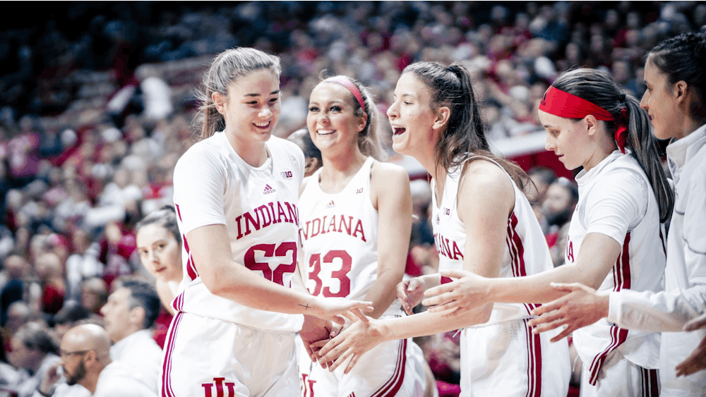 The Indiana bench celebrates after a win Jan. 15, 2023 at Simon Skjodt Assembly Hall in Bloomington, Indiana. The Hoosiers beat Wisconsin 56-93.
