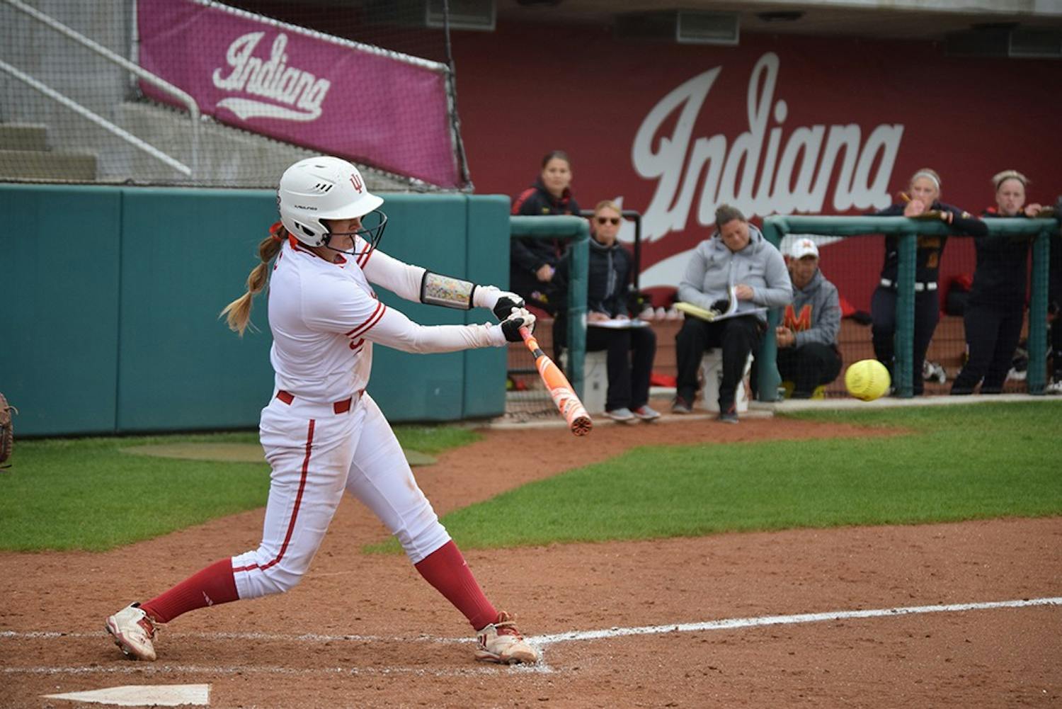 Senior Erin Lehman hits the ball in the second game against Maryland on Friday, April 21, 2017. The Hoosiers swept the Terrapins in the weekend series.