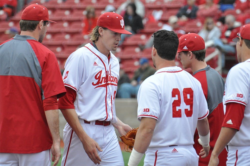 Senior pitcher Evan Bell walks off the field after pitching five innings last Saturday against the Rockets. Bell The Hoosiers played Toledo four times over the weekend, winning three of the four games. 