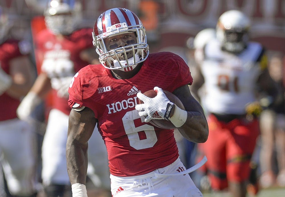 Junior running back Tevin Coleman breaks off a run during IU's game against Maryland on Sept. 27 at Memorial Stadium.