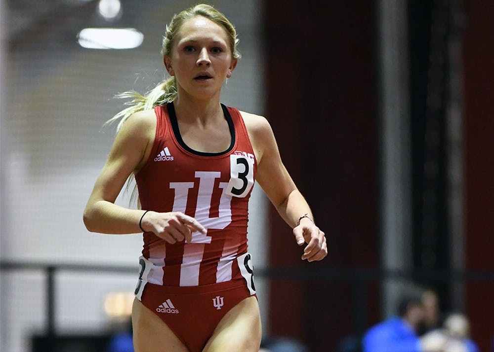 Junior Katherine Receveur races in the 5000 meter in the Hoosier Open in Harry Gladstein Fieldhouse. Receveur won the event in a new facility record time of 15:48.10. She, and six other teammates competed in the Alex Wilson Invitational this weekend.