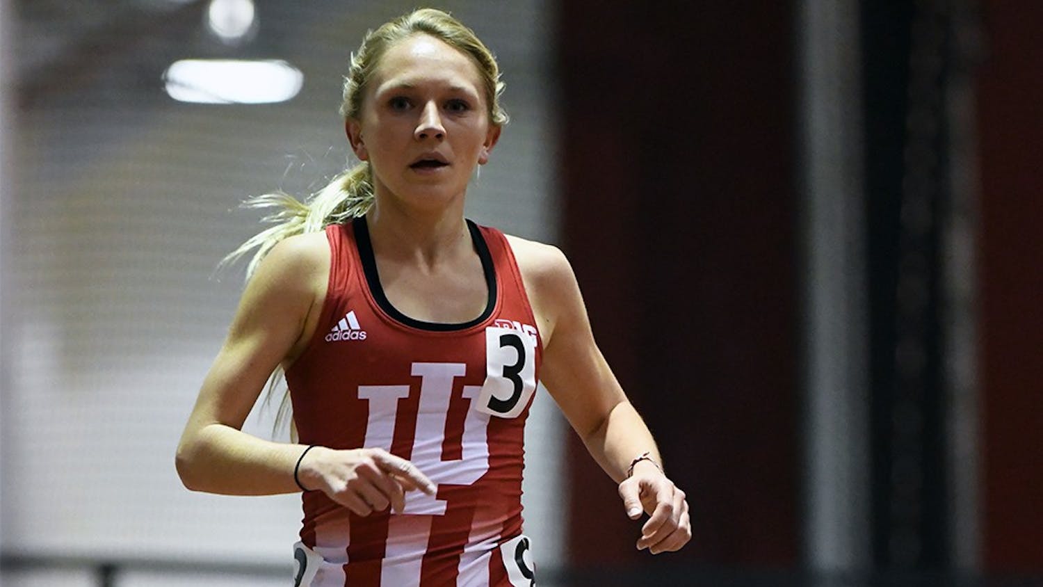 Junior Katherine Receveur races in the 5000 meter in the Hoosier Open in Harry Gladstein Fieldhouse. Receveur won the event in a new facility record time of 15:48.10. She, and six other teammates competed in the Alex Wilson Invitational this weekend.
