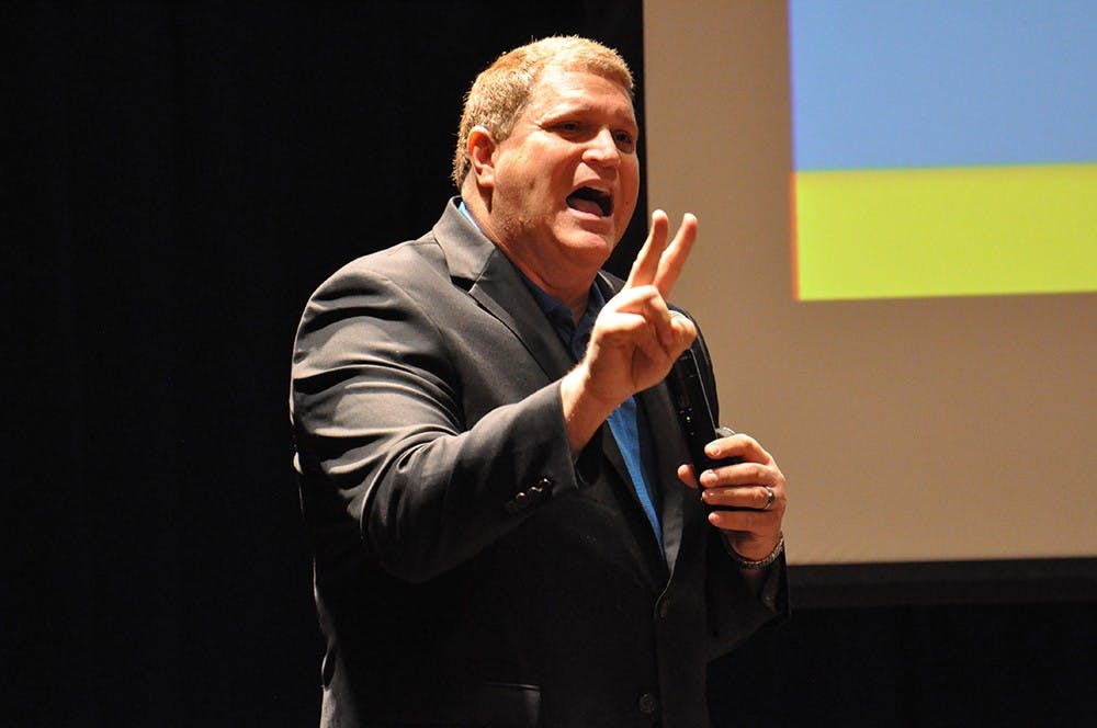 David Coleman, 'The Dating Doctor', speaks at the Indiana Memorial Union's Whittenberger Auditorium on Tuesday evening. Coleman was invited to campus to give his lecture on dating, break ups and sexuality.