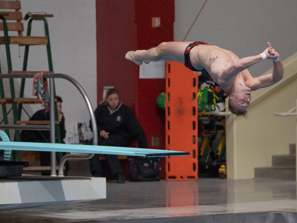 Graduate diver Andrew Capobianco completes a dive on March 9, 2023, during the NCAA Zone C men&#x27;s diving championship at the Councilman-Billingsley Aquatics Center. Capobianco will compete in the 1-meter springboard, 3-meter springboard and platform diving events at the NCAA Championships this weekend.