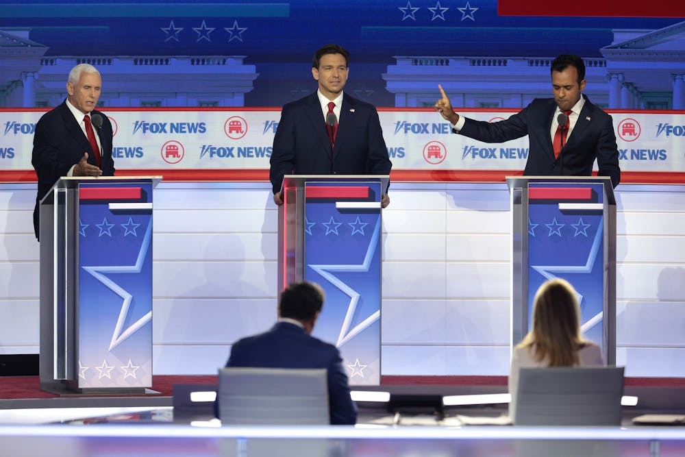 <p>Republican presidential candidates, left to right, former U.S. Vice President Mike Pence, Florida Gov. Ron DeSantis and Vivek Ramaswamy participate in the first debate of the GOP primary season hosted by Fox News on Aug. 23, 2023, at the Fiserv Forum,in Milwaukee. <br/></p>
