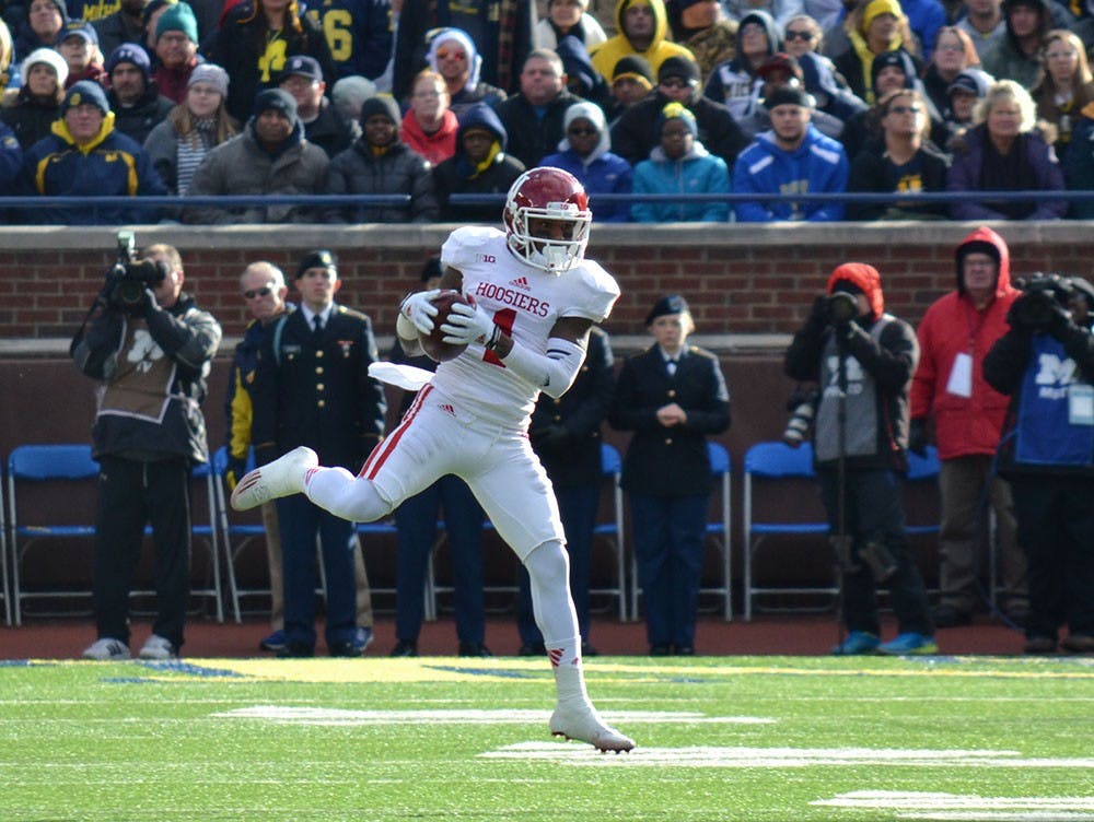 Senior wide receiver Shane Wynn catches a pass during the game against Michigan on Nov. 1 at Michigan Stadium.