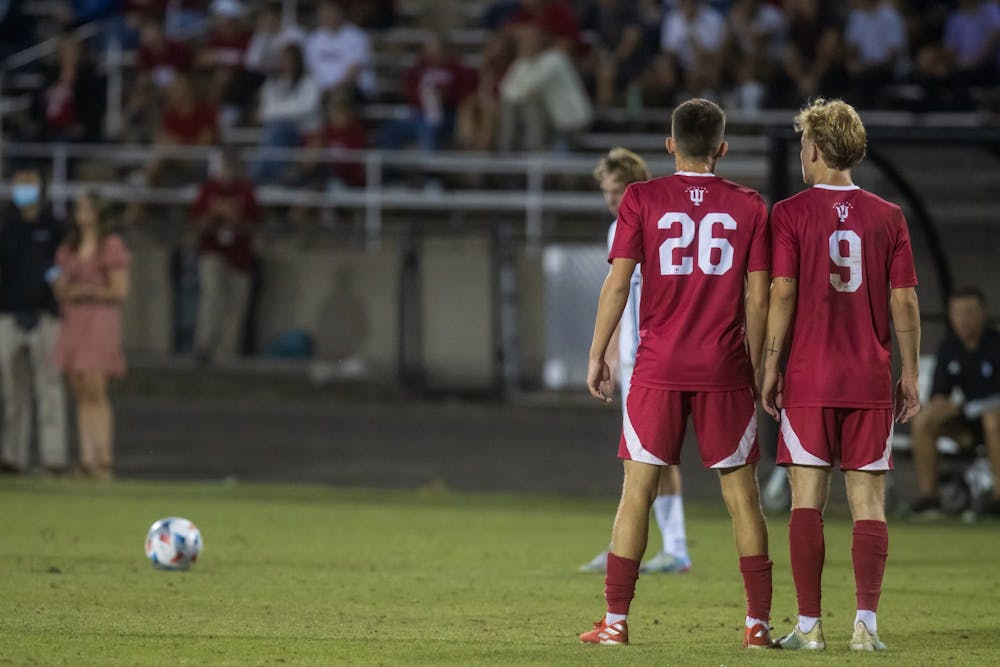 Sophomore forward Nate Ward and freshman forward Samuel Sarver stand ready to block a free kick Sept. 3, 2021, at Bill Armstrong Stadium in Bloomington. Indiana men's soccer fell to the No. 2 University of Washington in the Sweet 16 of the NCAA Tournament on Saturday in Seattle. 
