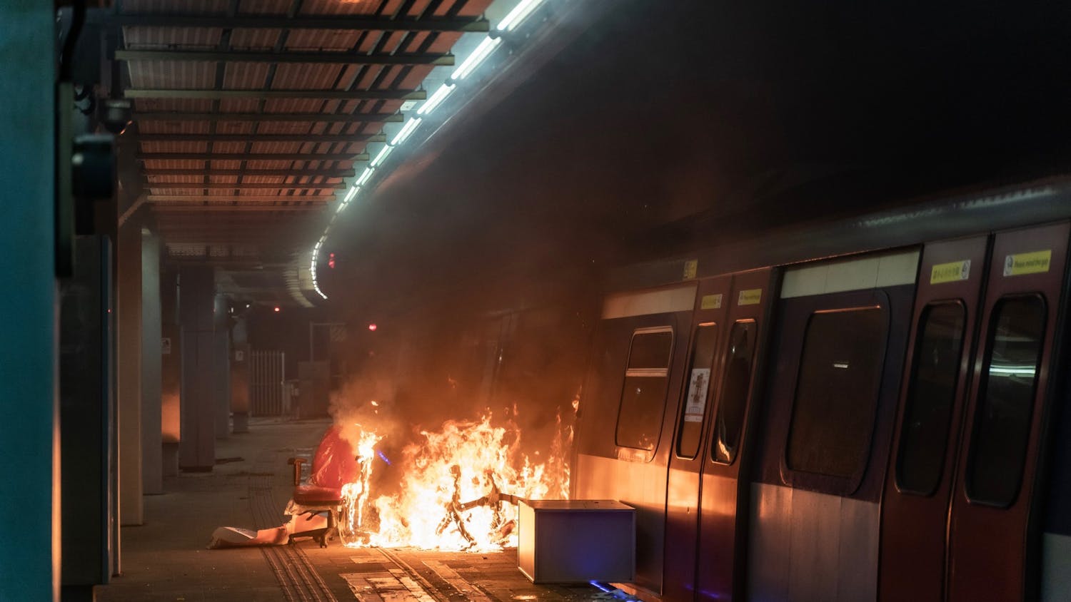 A fire is seen at an MTR station Nov. 13 during a demonstration at the Chinese University of Hong Kong in Hong Kong, China. 