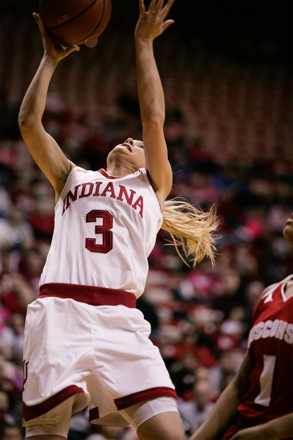 Sophomore guard Tyra Buss goes up to the basket to attempt a layup against Wisconsin. Buss scored 24 points against the Badgers, leading the Hoosiers to a 67-57 victory Sunday at Assembly Hall.