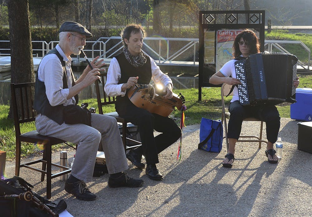 Daily Bread & Butter, a local band, plays music of Northwest Spain during the Nature Sounds event at Griffy Lake on Thursday. 