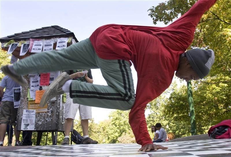 Junior Keane Rowley breakdances in front of Ballantine Hall Tuesday afternoon.  Rowley and others performed as part of "Breakin Da Ballot," an event organized by several student Hip Hop organizations to draw attention to voter registration.  For more information search for the event "Breakin Da Ballot" on facebook.