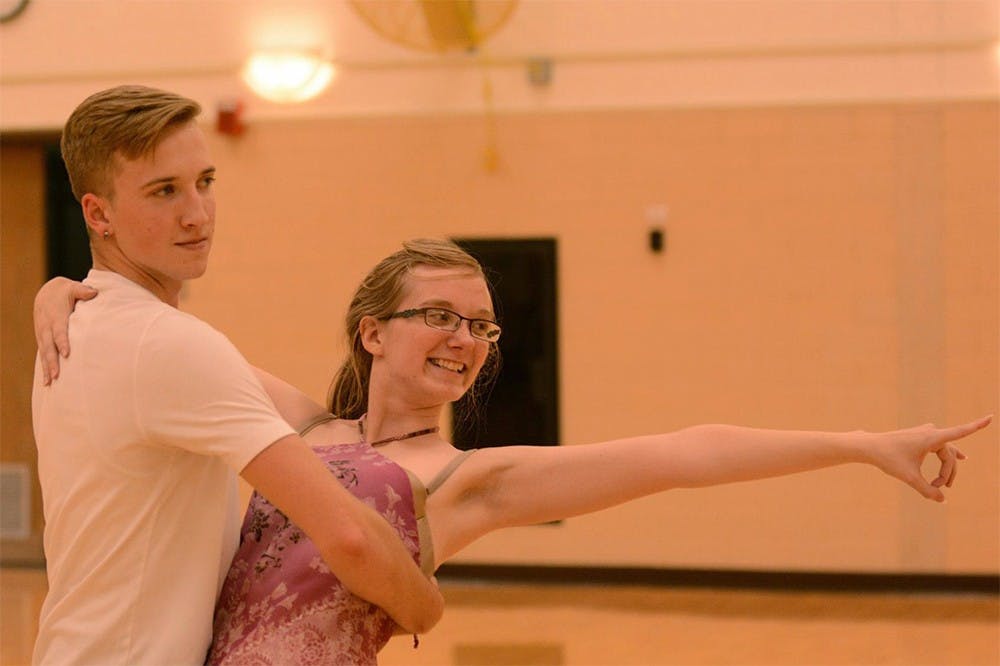 Nicholas Benedict and Sarah Harrison, vice-president and president of IU Ballroom Dance Club, rehearse for the call-out meeting. The meeting will be held at 7:70 p.m. on Thursday in Alumni Hall.