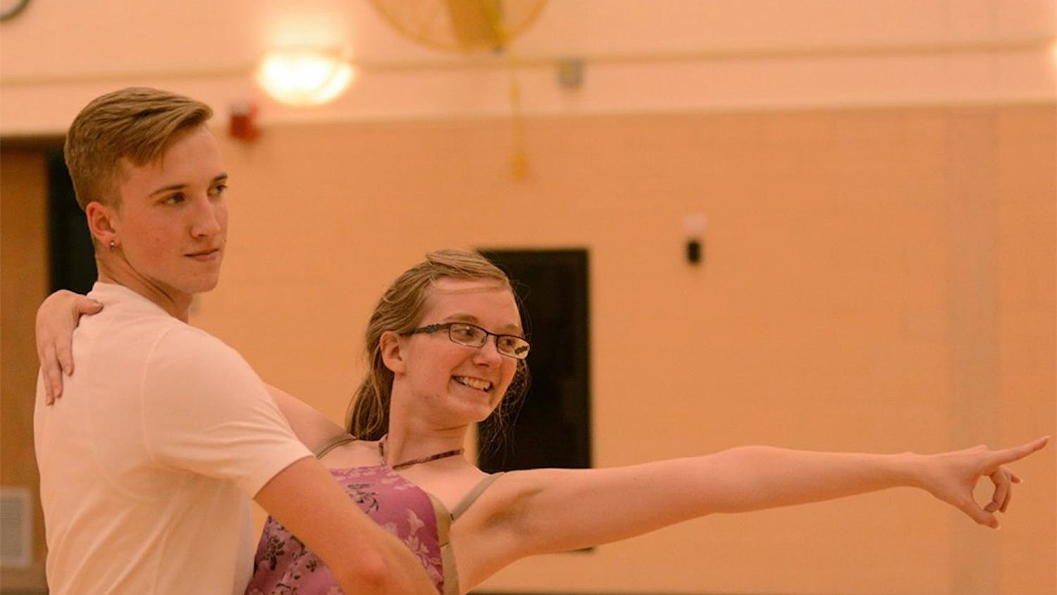 Nicholas Benedict and Sarah Harrison, vice-president and president of IU Ballroom Dance Club, rehearse for the call-out meeting. The meeting will be held at 7:70 p.m. on Thursday in Alumni Hall.
