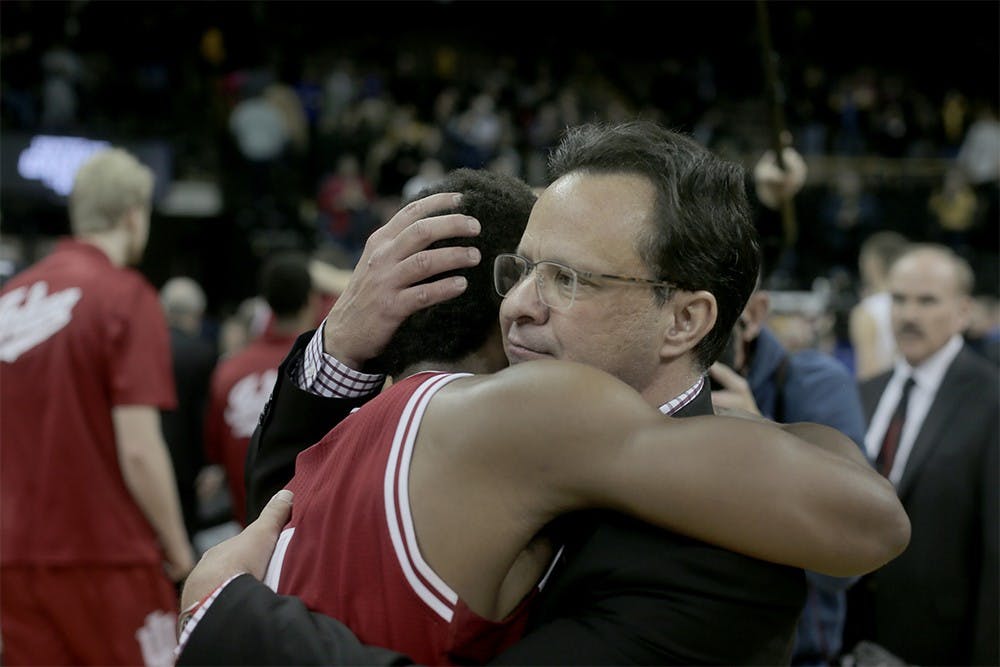 Senior guard Yogi Ferrell embraces IU Coach Tom Crean following IU's 81-78 win at Iowa. (The Daily Iowan)