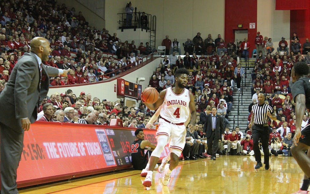 Junior Robert Johnson dribbles the ball down the court. IU defeated SEMO 83-55.