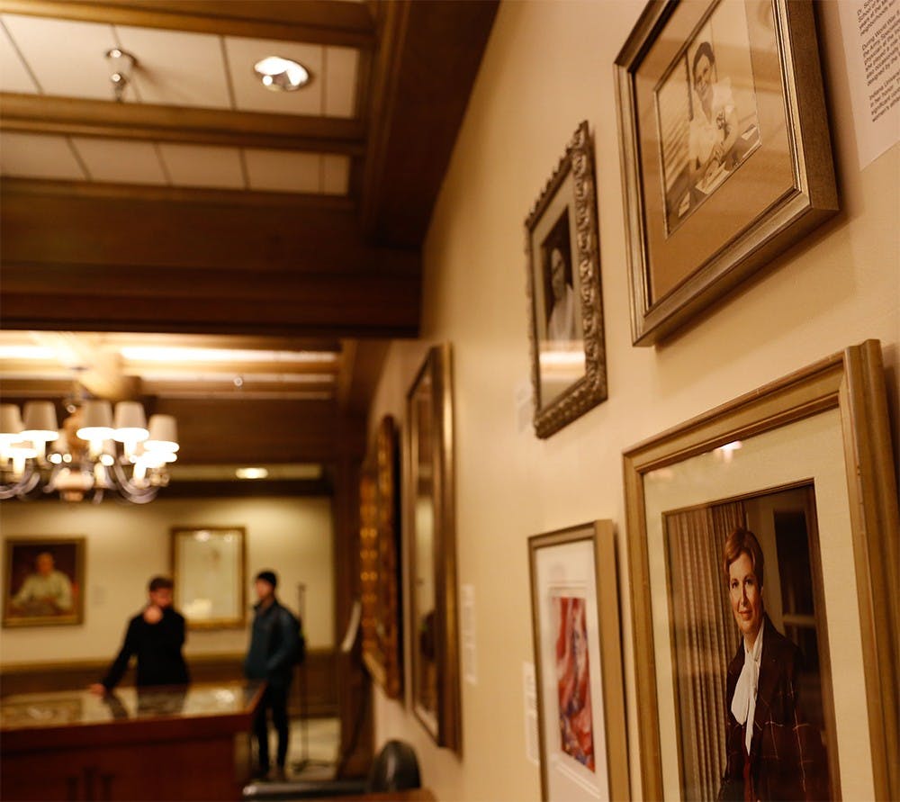 Portraits of women dedicated to IU are displayed Tuesday at lounge inside of the IMU. 